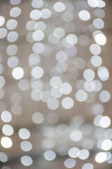 Abstract blurred bokeh background. Bright winter decorations, at night.