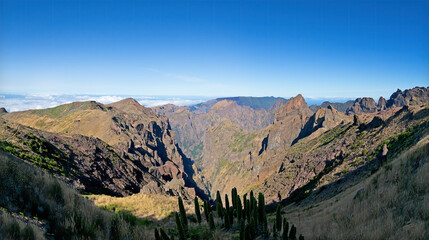 Panoramic view from peak Arieiro (pico do Arieiro) in Madeira Island with blue sky.