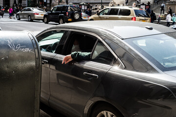 Hand, outside the car, New York City, USA