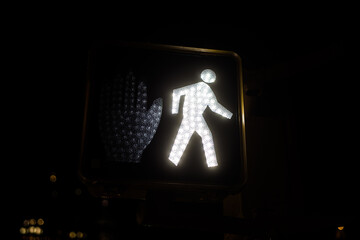 Crossing sign in the night, New York City, USA
