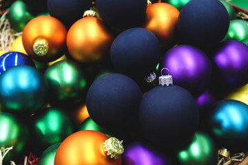 Background of festive christmas balls different colors close-up. Winter holidays, Christmas and New Year concept