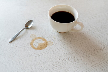 top view of print of coffee cup on the table on breakfast, black circle