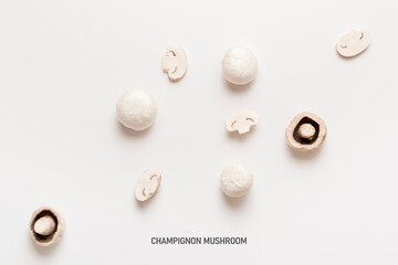 simple mushroom champignon, raw sliced pieces, creative flat lay layout, view from above