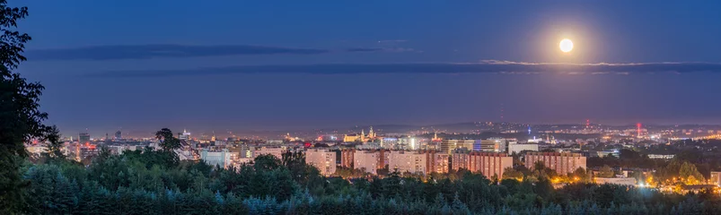 Foto op Canvas Full moon over Krakow, Poland, seen from Bronowice district © tomeyk