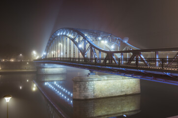 Krakow Poland, Pilsudski bridge over Vistula river in the night