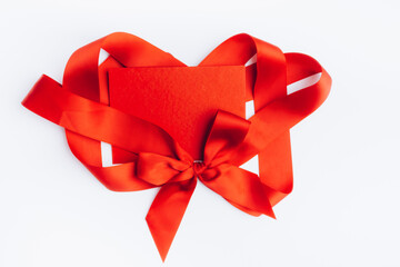 red letter with ribbon bow to Valentine's Day