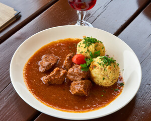 Traditional hot home made food in alpine rifugio in the Dolomite Alps