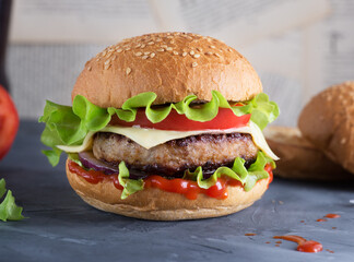 Hamburger made from fresh vegetables with a cutlet.