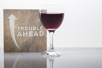 Trouble ahead with wine glass