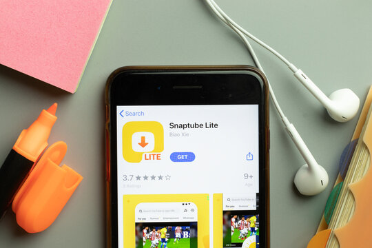 New York, USA - 1 December 2020: Snaptube Lite mobile app icon on phone screen top view, Illustrative Editorial