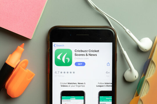 New York, USA - 1 December 2020: Cricbuzz Cricket Scores mobile app icon on phone screen top view, Illustrative Editorial