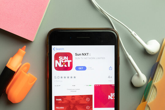 New York, USA - 1 December 2020: Sun NXT mobile app icon on phone screen top view, Illustrative Editorial