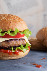 Hamburger made from fresh vegetables with a cutlet.