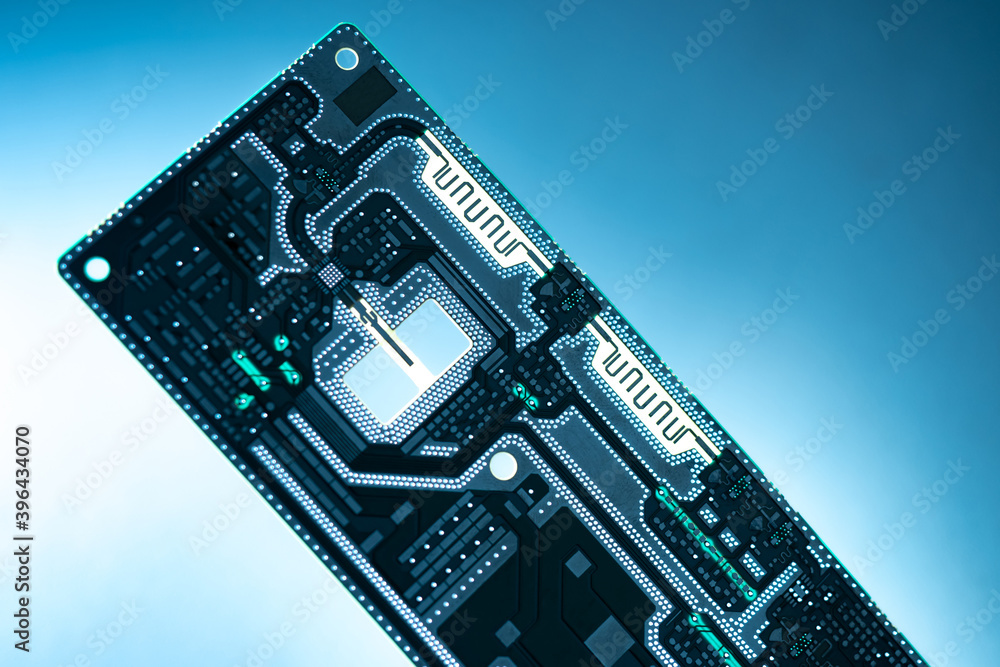 Poster pcb on a blue background. background of a printed circuit board with microchips. the circuit board i