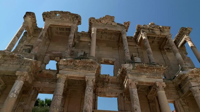 Footage of The Library of Celsus at famous ancient Greek city called "Ephesus" on the coast of Ionia located southwest of Sel&ccedil;uk in Izmir, Turkey.