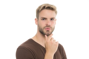 Obraz premium unshavem handsome confident man with stylish hairdo and casual wear isolated on white, mens beauty