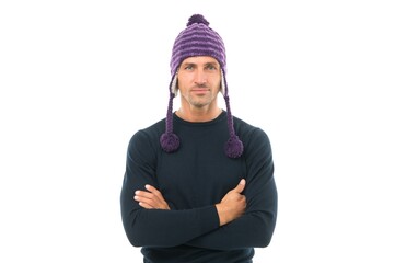 handsome mature male in winter warm knitted hat isolated on white, weather