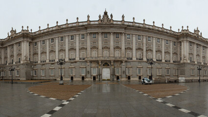 Obraz premium Heritage. Monumental architecture and design. Panorama view of the Royal Palace of Madrid baroque facade in Madrid, Spain.