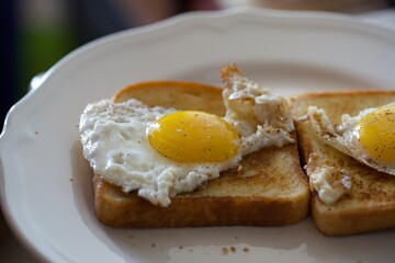 Eggs in a basket - Fried Eggs on Toast ready for breakfast
