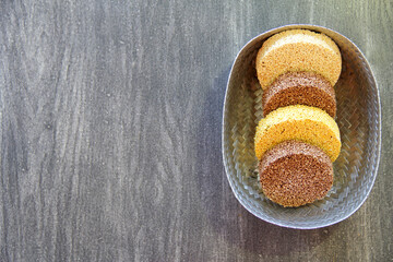 alegrias, typical Mexican sweet made of amaranth in basket and vintage gray background