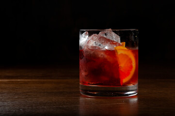 negroni cocktail over a wooden table