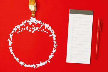 flat lay with christmas ball and notebook