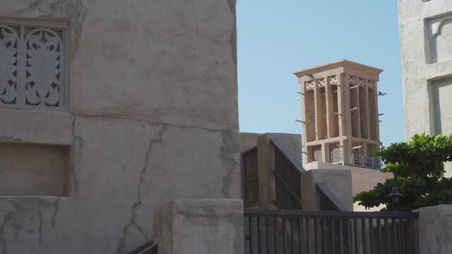 Wind Tower On Building At Dubai Heritage In Al Fahidi Historical Neighbourhood, UAE. - Slider Shot