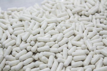 Capsule production process in factory.