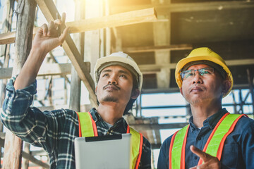 Two engineer worker work in construction site, Engineer inspector on site building