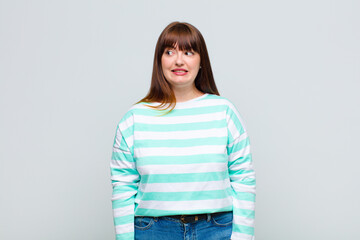 overweight woman looking worried, stressed, anxious and scared, panicking and clenching teeth