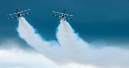 civil jets maneuvering in the sky during an air parade