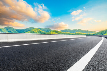 Fototapeta premium Country asphalt road and green tea plantation with bamboo forest natural landscape.