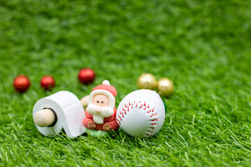 Baseball Christmas Holiday with Tissue roll on green grass