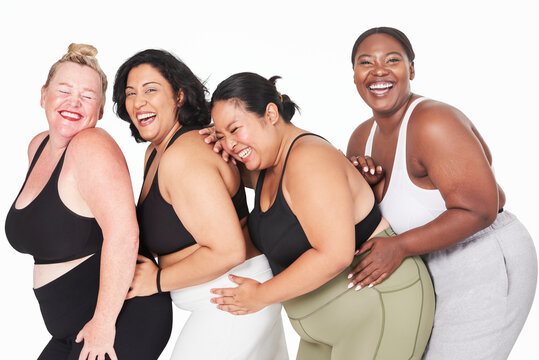 Attractive diverse curvy women sportswear studio shot