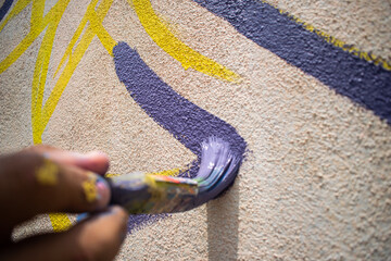 Pintando mural © Colectivo