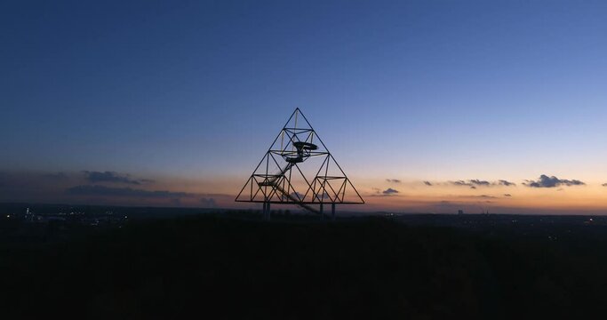 Tetraeder or tetrahedron in Bottrop at sunset, Germany. Zoom out