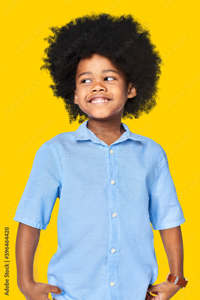 Sticker Black boy wearing blue shirt in studio