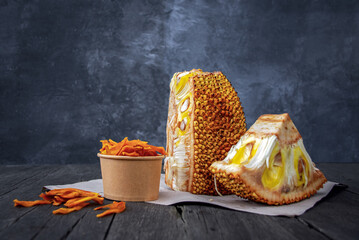 jackfruit chips (Artocarpus heterophyllus) in a bowl in wooden background
