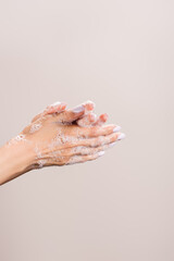 Fototapeta premium cropped of woman washing hands isolated on grey
