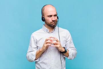 bald man scheming and conspiring, thinking devious tricks and cheats, cunning and betraying