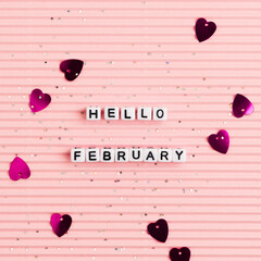 White HELLO FEBRUARY beads message typography