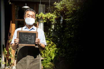 New normal business owner in Japanese cafe reopening