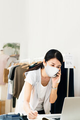 Retailer in medical mask, new normal store opening