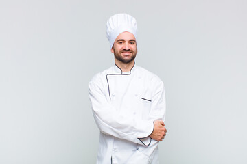 bald man laughing shyly and cheerfully, with a friendly and positive but insecure attitude