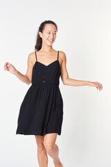 Naklejka premium Happy woman in a black dress mockup