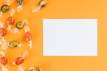 White card with copy space on an orange background
