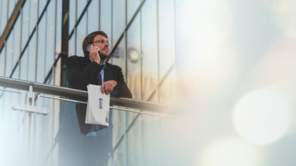 Businessman speaking on his mobile phone