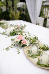 a beautiful flower decoration on a dinning table