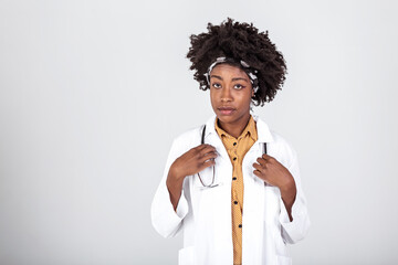 medicine, profession and healthcare concept - happy smiling african american female doctor in white coat with stethoscope over background