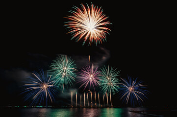 Fototapeta na wymiar fireworks over the beach in Thailand,New year eve 2020 Pattaya firework Festival